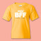 Mini BFF yellow youth tee on a pink background Annie Downs